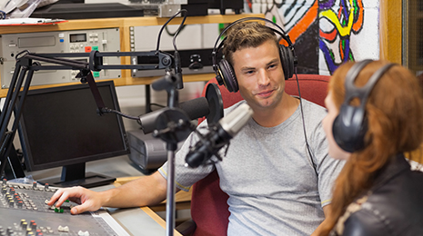 Man and woman in radio station